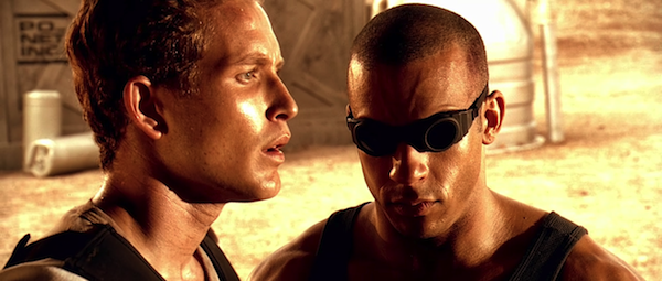 Cole Hauser as William J. Johns and Vin Diesel as Richard B. Riddick in Pitch Black