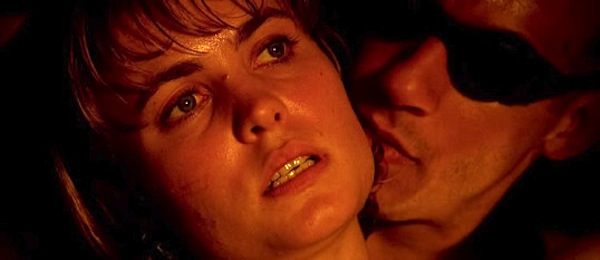 Radha Mitchell as Carolyn Fry and Vin Diesel as Richard B. Riddick in Pitch Black
