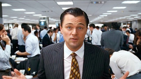 Leonardo DiCaprio as Jordan Belfort addresses the camera in The Wolf of Wall Street