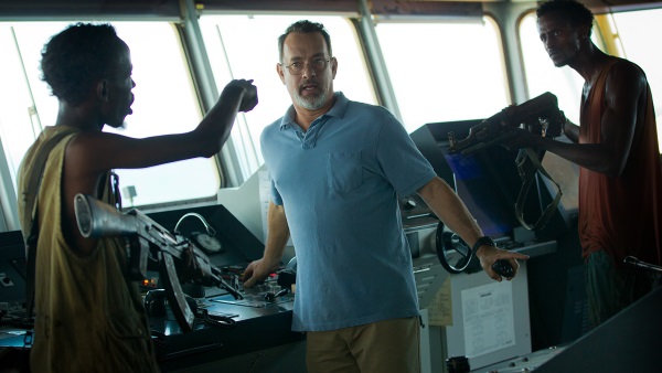 Barkhad Abdi, Tom Hanks and Faysal Ahmed
