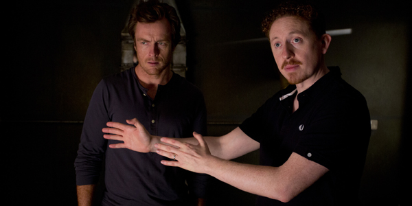 Toby Stephens as Vincent, with Caradog James on the set of The Machine