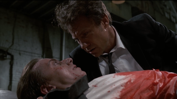 Tim Roth and Harvey Keitel in Reservoir Dogs, written by Quentin Tarantino, after hearing a Dov Simens talk