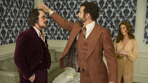 Christian Bale as Irving Rosenfeld, Bradley Cooper as Richie DiMaso and Amy Adams as Sydney Prosser in American Hustle Christian Bale as Irving Rosenfeld, Bradley Cooper as Richie DiMaso and Amy Adams as Sydney Prosser in American Hustle