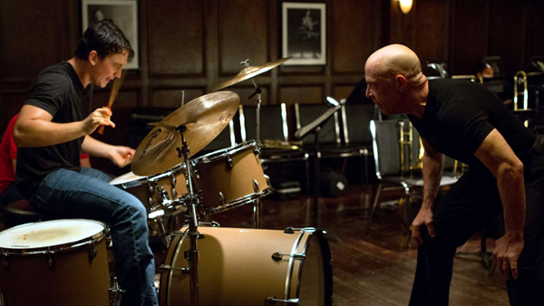 Miles Teller as Andrew and J.K. Simmons as Fletcher in Whiplash
