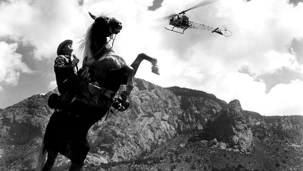 Kirk Douglas as John W. "Jack" Burns in Lonely are the Brave Kirk Douglas as John W. "Jack" Burns in Lonely are the Brave
