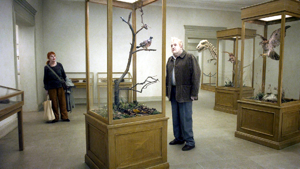 Nils Westblom as Sam in A Pigeon Sat on a Branch Reflecting on Existence 