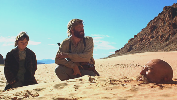 Josh Albee as Caleb and Robert Redford as Jeremiah Johnson in Jeremiah Johnson 
