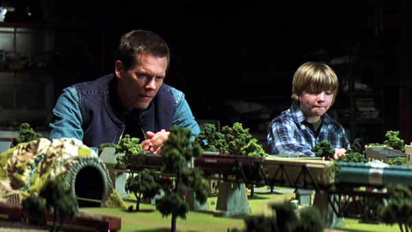 Kevin Bacon as Tom Stark and Miles Heizer as Davey Danner in Rails and Ties Kevin Bacon as Tom Stark and Miles Heizer as Davey Danner in Rails and Ties
