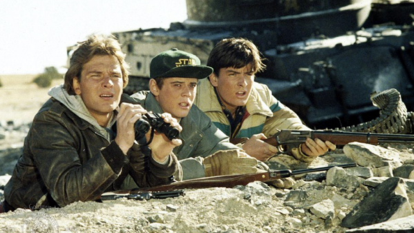 Patrick Swayze as Jed, C. Thomas Howell as Robert and Charlie Sheen as Mat in Red Dawn 