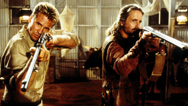 Val Kilmer as Col. John Henry Patterson and Michael Douglas as Charles Remington in The Ghost and the Darkness