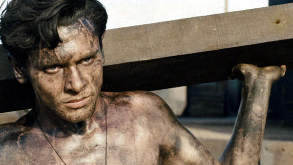 Jack O'Connell as Louis Zamperini in Unbroken