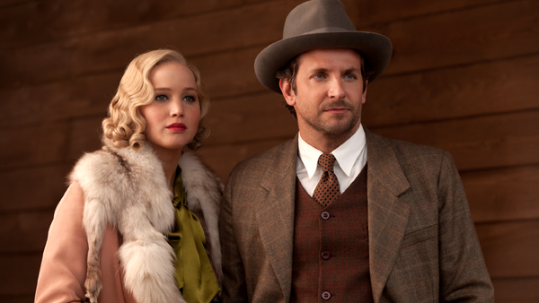 Jennifer Lawrence as Serena and Bradley Cooper as Pemberton in Serena