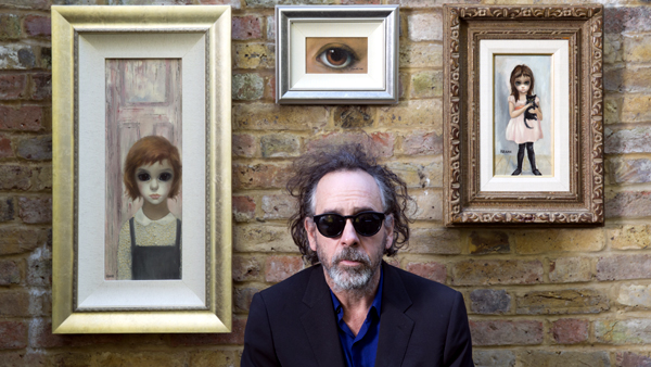 Tim Burton with his Margaret Keane paintings