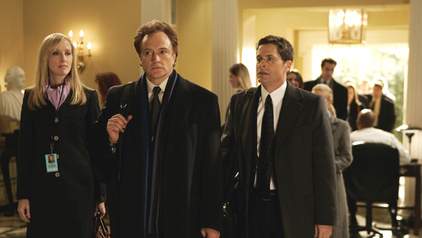 Janel Moloney as Donna Moss, Bradley Whitford as Josh Lyman and Rob Lowe as Sam Seaborn in The West Wing