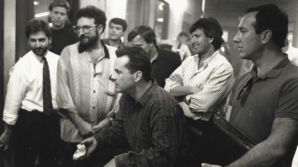 On the set of Die Hard: (l-r) Joel Silver, Bruce Willis, Joe Roth, Steven E. de Souza