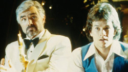 Burt Reynolds as Jack Horner and Mark Mark Wahlberg as Dirk Diggler in Boogie Nights