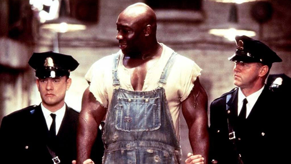 Tom Hanks as Paul Edgecomb, Michael Clarke Duncan as John Coffey and David Morse as Brutus 'Brutal' Howell in The Green Mile