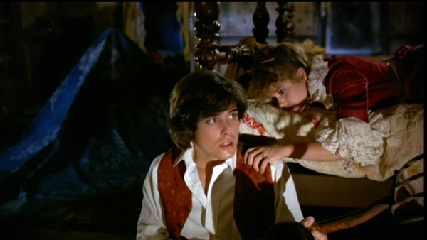 Peter Barton as Jeff Reed and Linda Blair as Marti Gaines in Hell Night