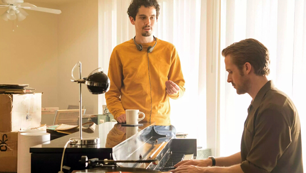 Damien Chazelle with Ryan Gosling on set of La La Land