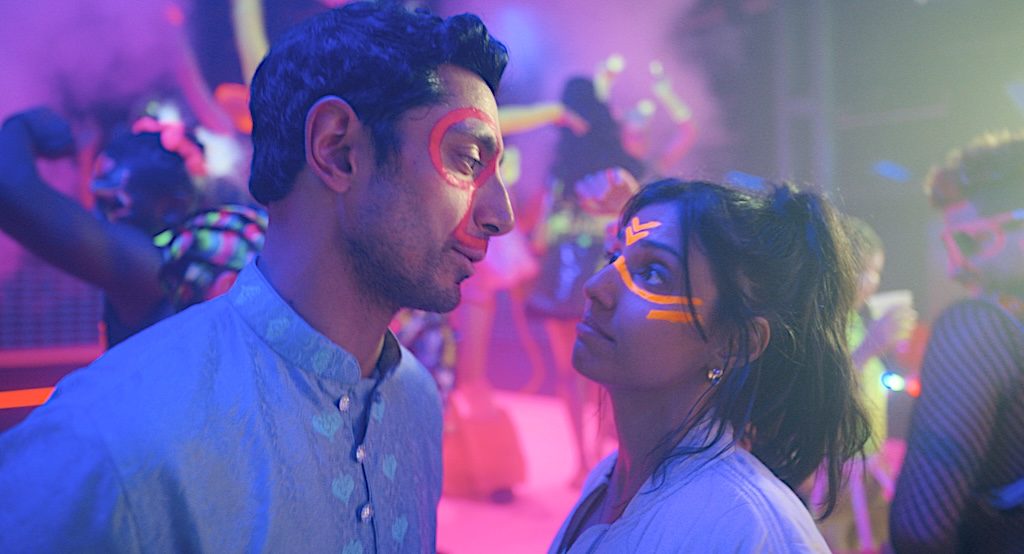 Riz Ahmed as Shah Latif and Ritu Arya as Tasmin in Bait